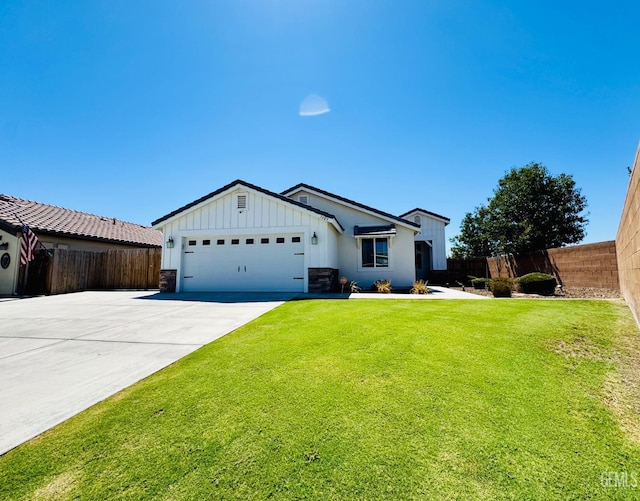 7303 Wild Mustang Dr, Bakersfield, CA 93311 - view of front facade featuring board and batten siding, a garage, and concrete driveway
