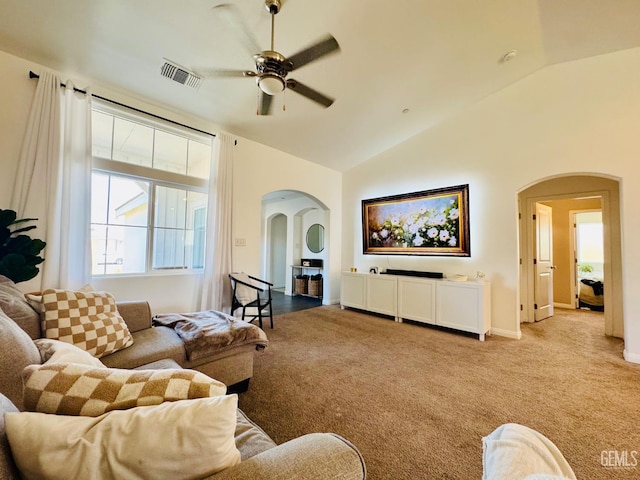 7303 Wild Mustang Dr, Bakersfield, CA 93311 - carpeted living room featuring arched walkways, ceiling fan, and high vaulted ceiling