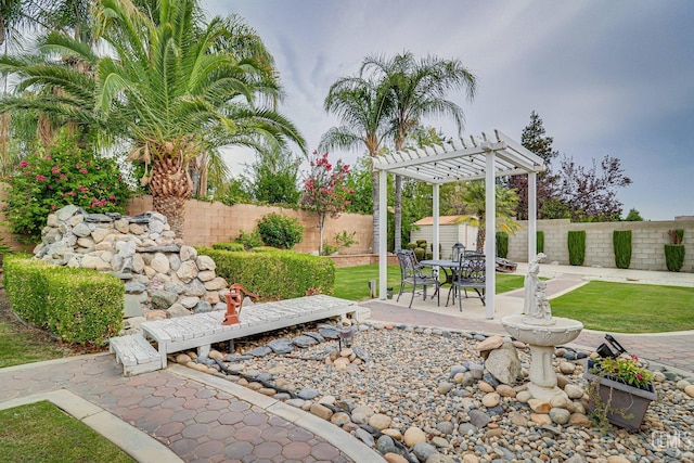 view of patio featuring a shed