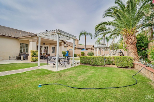 view of yard featuring a pergola and a patio