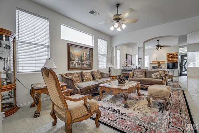 living room featuring ceiling fan