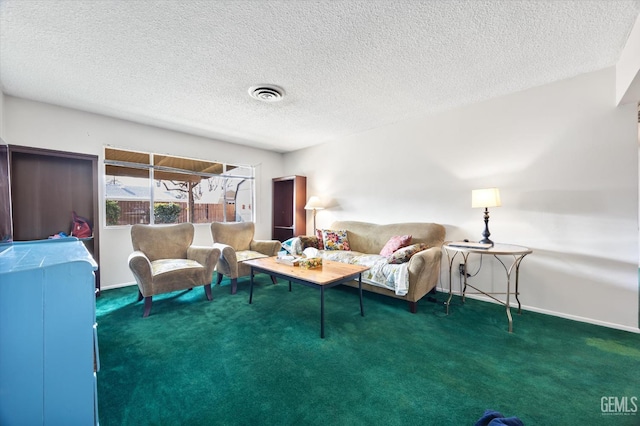 living room featuring a textured ceiling and dark carpet