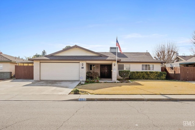 ranch-style house featuring a garage