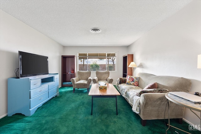 carpeted living room with a textured ceiling