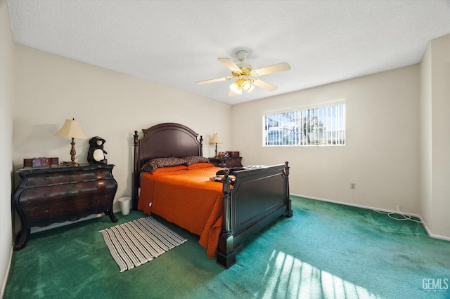 carpeted bedroom with a textured ceiling and ceiling fan