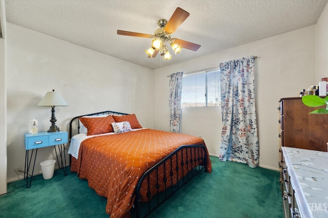 carpeted bedroom with ceiling fan and a textured ceiling