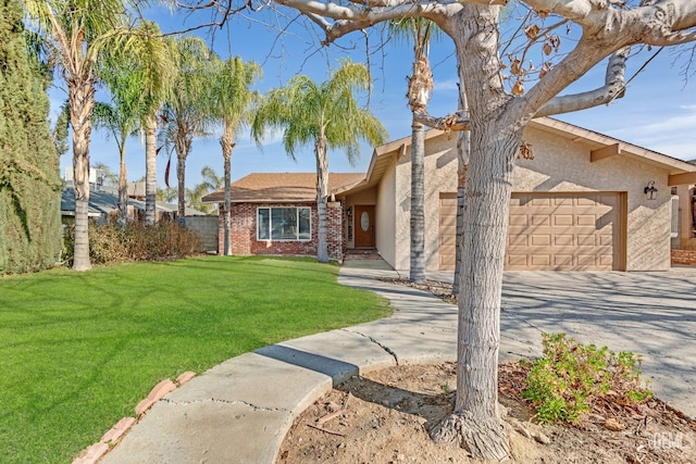 view of front of home with a garage and a front yard