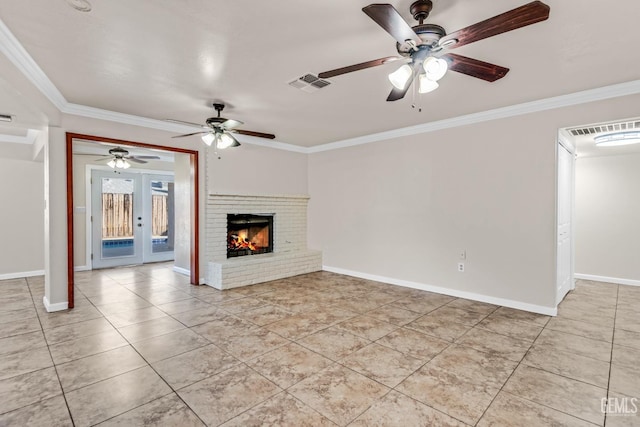 unfurnished living room featuring ornamental molding, light tile patterned flooring, a fireplace, and french doors