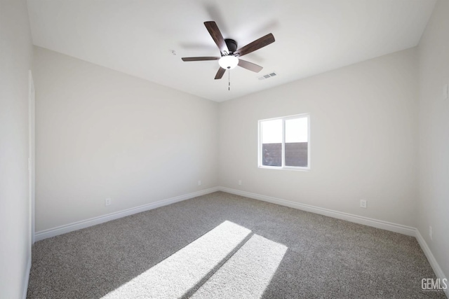 unfurnished room featuring carpet flooring and ceiling fan