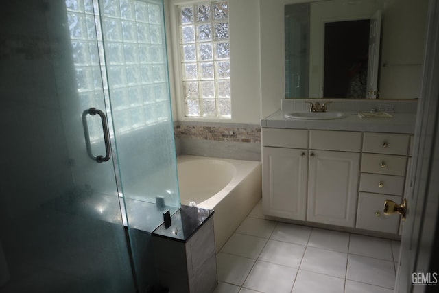 5808 Greenhorn Mountain Ct, Bakersfield, CA 93313 - full bathroom featuring vanity, a bath, a stall shower, and tile patterned flooring