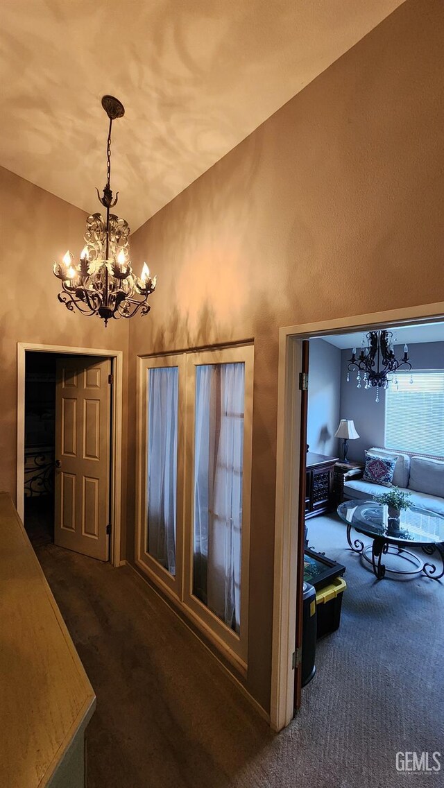 3808 Mariana Way, Bakersfield, CA 93311 - dining space with a chandelier, carpet floors, and lofted ceiling
