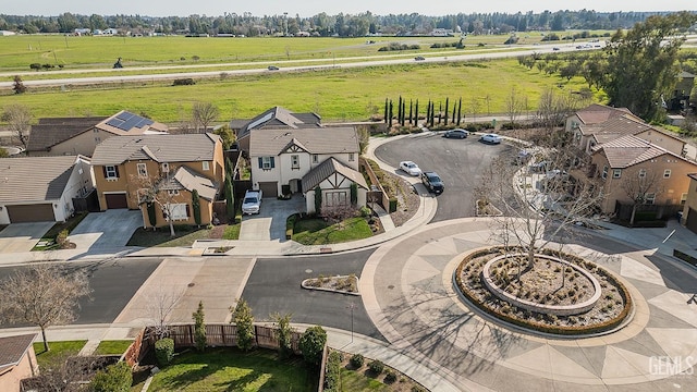 birds eye view of property featuring a rural view