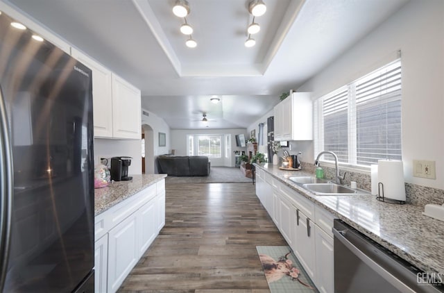 801 Crown Pointe Dr, Bakersfield, CA 93312 - kitchen featuring fridge, stainless steel dishwasher, a tray ceiling, a sink, and wood finished floors