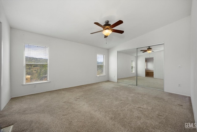 11543 Jay Dr, Caliente, CA 93518 - unfurnished bedroom featuring lofted ceiling, visible vents, a closet, carpet, and a ceiling fan