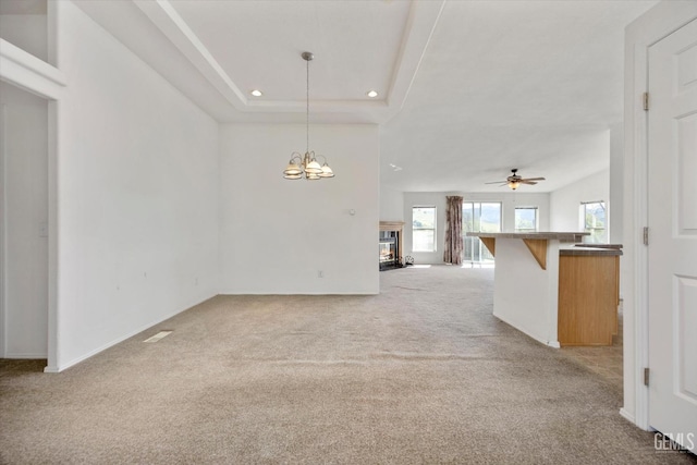 11543 Jay Dr, Caliente, CA 93518 - unfurnished room with light colored carpet, recessed lighting, baseboards, and ceiling fan with notable chandelier
