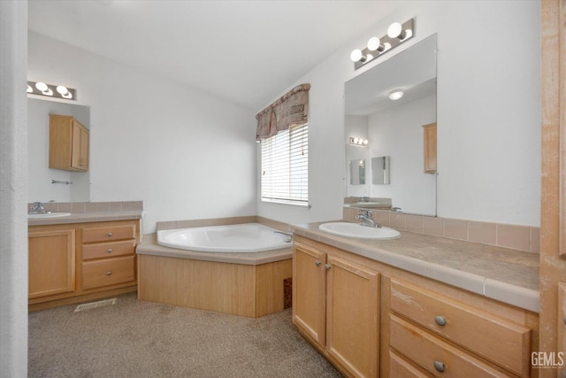 11543 Jay Dr, Caliente, CA 93518 - full bath featuring two vanities, a garden tub, and a sink