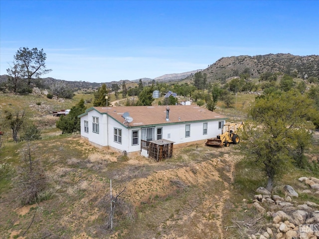 11543 Jay Dr, Caliente, CA 93518 - back of property with a deck with mountain view