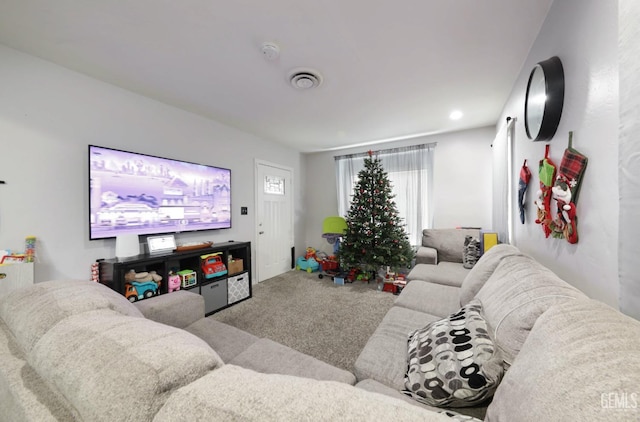 carpeted living room featuring visible vents