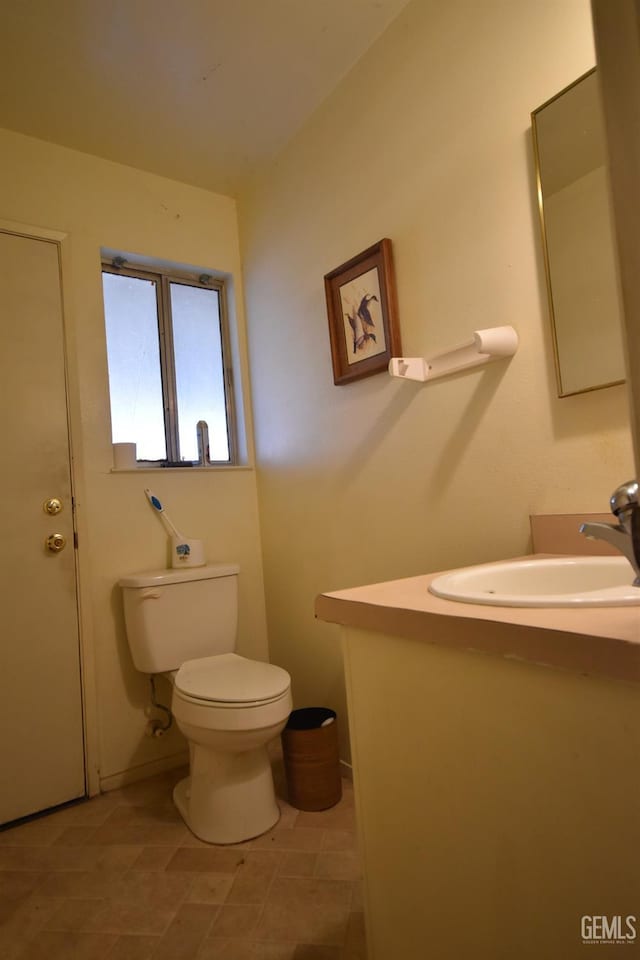 bathroom featuring sink and toilet