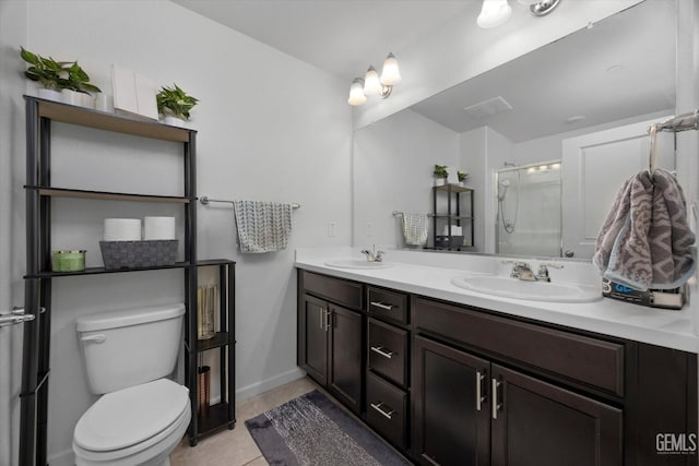 bathroom with toilet, a stall shower, tile patterned floors, and double vanity