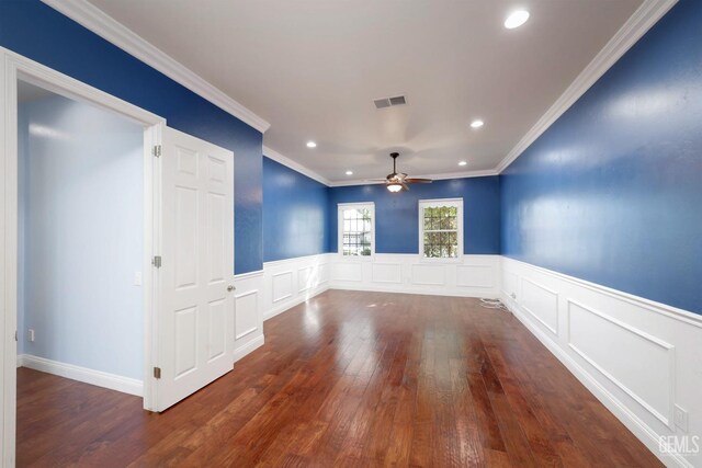 unfurnished room with ceiling fan, dark wood-type flooring, and ornamental molding