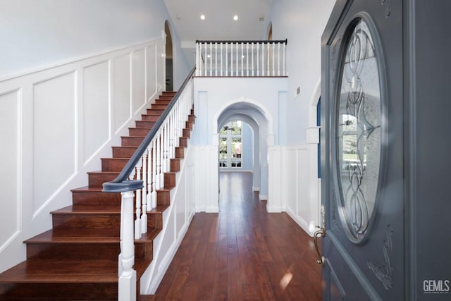 entryway featuring french doors and dark hardwood / wood-style flooring