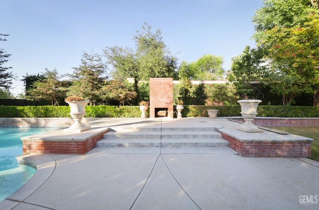 view of home's community with a patio area and a swimming pool