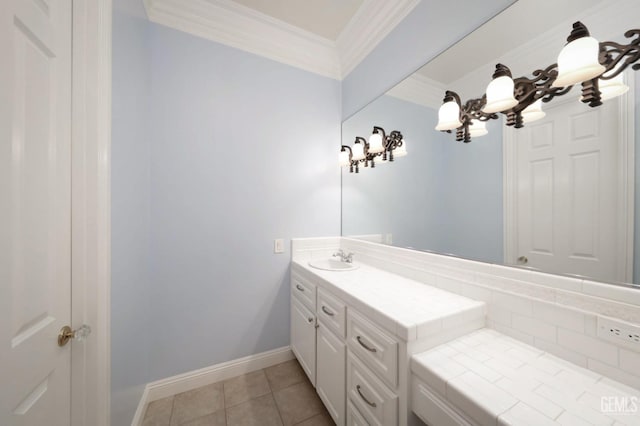 bathroom with tile patterned floors, vanity, and ornamental molding