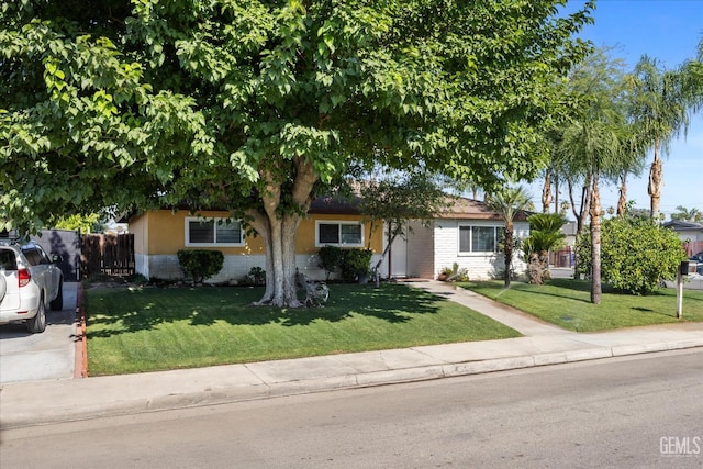 4501 Chadbourn St, Bakersfield, CA 93307 - view of property hidden behind natural elements featuring brick siding