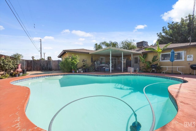 4501 Chadbourn St, Bakersfield, CA 93307 - view of swimming pool with a fenced backyard