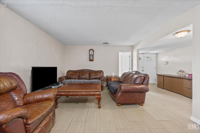 4501 Chadbourn St, Bakersfield, CA 93307 - living area with a textured ceiling