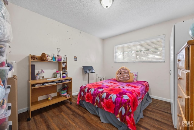 4501 Chadbourn St, Bakersfield, CA 93307 - bedroom featuring wood finished floors and a textured ceiling