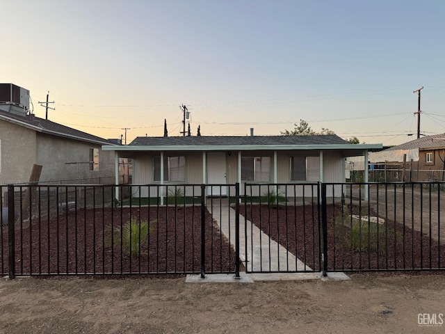 7704 Buena Vista Blvd, Lamont, CA 93241 - ranch-style house with a porch, a fenced front yard, and central air condition unit