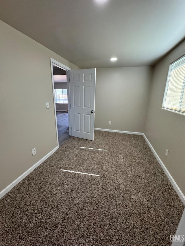 7704 Buena Vista Blvd, Lamont, CA 93241 - spare room featuring baseboards and carpet flooring