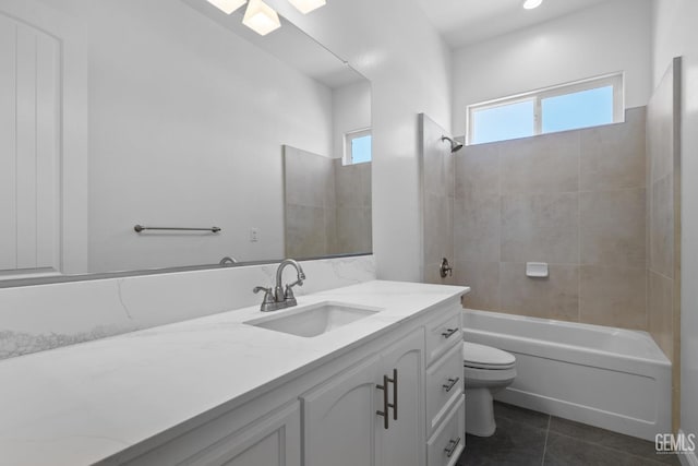 8708 Tamburlane Ct, Bakersfield, CA 93314 - full bath with vanity, tile patterned floors, and shower / washtub combination