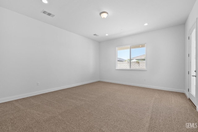 8708 Tamburlane Ct, Bakersfield, CA 93314 - empty room with recessed lighting and light colored carpet