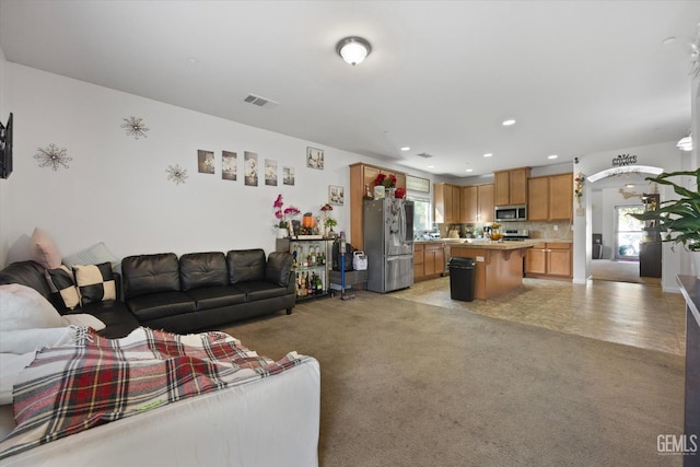 living room featuring light colored carpet