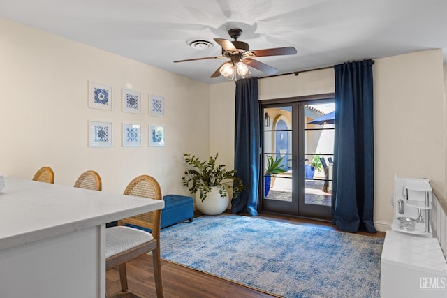 401 Via Carisma, Bakersfield, CA 93309 - dining room featuring french doors, wood finished floors, a ceiling fan, and baseboards