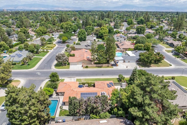 401 Via Carisma, Bakersfield, CA 93309 - aerial perspective of suburban area featuring a pool area