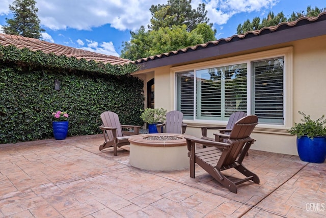 401 Via Carisma, Bakersfield, CA 93309 - view of patio featuring a fire pit