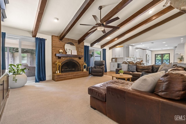 401 Via Carisma, Bakersfield, CA 93309 - living room with ceiling fan, beam ceiling, a brick fireplace, light colored carpet, and recessed lighting