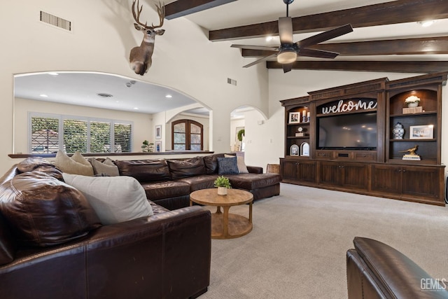 401 Via Carisma, Bakersfield, CA 93309 - carpeted living area featuring arched walkways, a ceiling fan, beam ceiling, high vaulted ceiling, and recessed lighting
