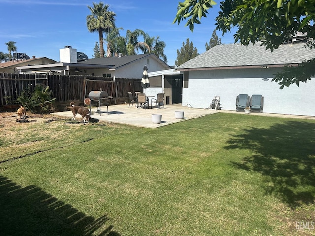 4017 Rio Del Norte St, Bakersfield, CA 93308 - back of property featuring a patio, stucco siding, and a shingled roof