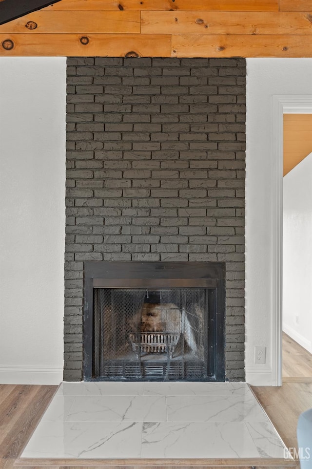 24501 Pueblo Ct, Tehachapi, CA 93561 - detailed view of a brick fireplace and baseboards