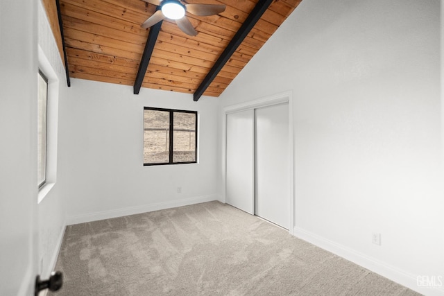 24501 Pueblo Ct, Tehachapi, CA 93561 - unfurnished bedroom featuring a wooden ceiling with exposed beams, carpet floors, a closet, ceiling fan, and high vaulted ceiling