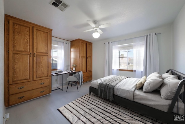 bedroom featuring visible vents and a ceiling fan