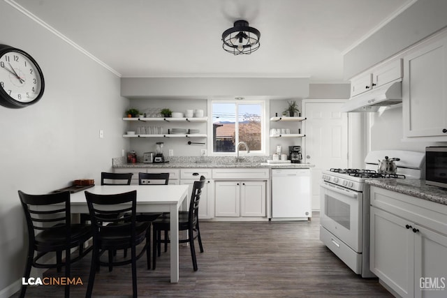 kitchen with white cabinetry, sink, ornamental molding, light stone countertops, and white appliances