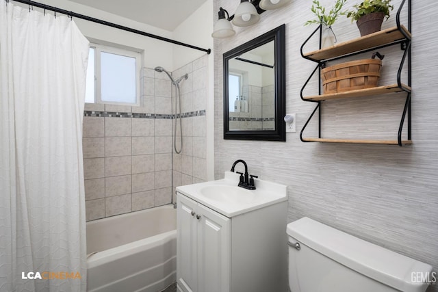 full bathroom featuring vanity, tile walls, shower / tub combo, and toilet