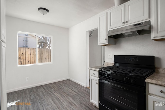 kitchen with black range with gas stovetop, light wood-type flooring, and white cabinets