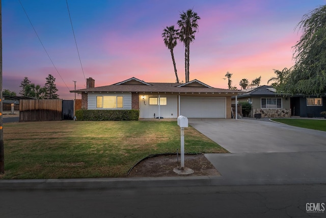 6101 Crestmore St, Bakersfield, CA 93308 - ranch-style home featuring an attached garage, a chimney, concrete driveway, and brick siding
